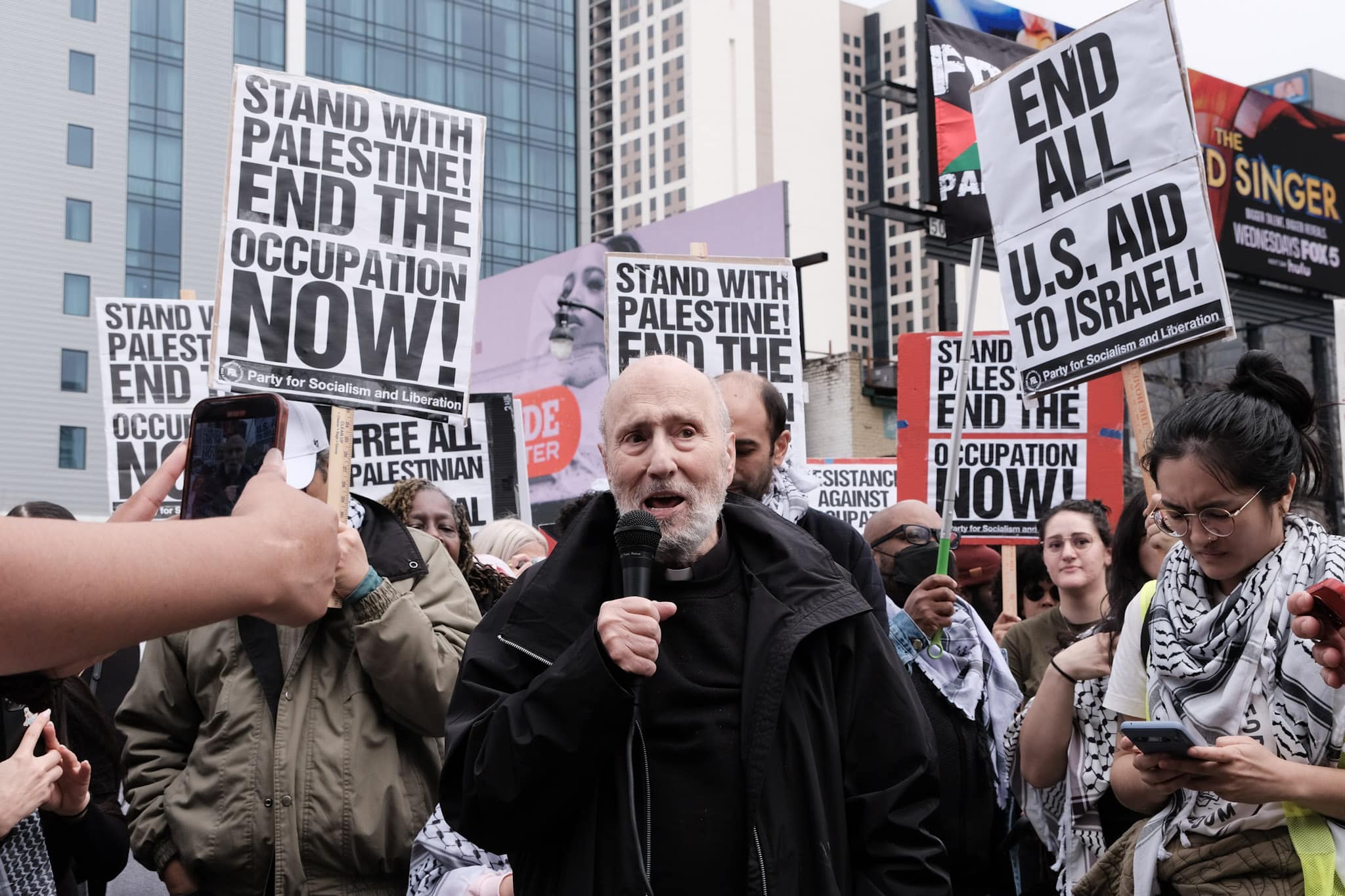 Father George Makhlouf, a retired Antiochian priest born in West Jerusalem prior to the Nakba in 1948 when over 700,000 Palestinians were forcibly displaced from Palestine, speaks to a crowd of protesters gathered in downtown Atlanta to protest Israel's ongoing genocide in Gaza