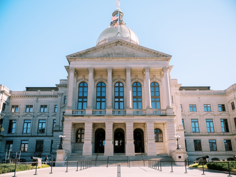 A photo of the the Georgia State Capitol, where the 2025 Georgia legislative session passed anti-trans legislation items attacking gender affirming care.