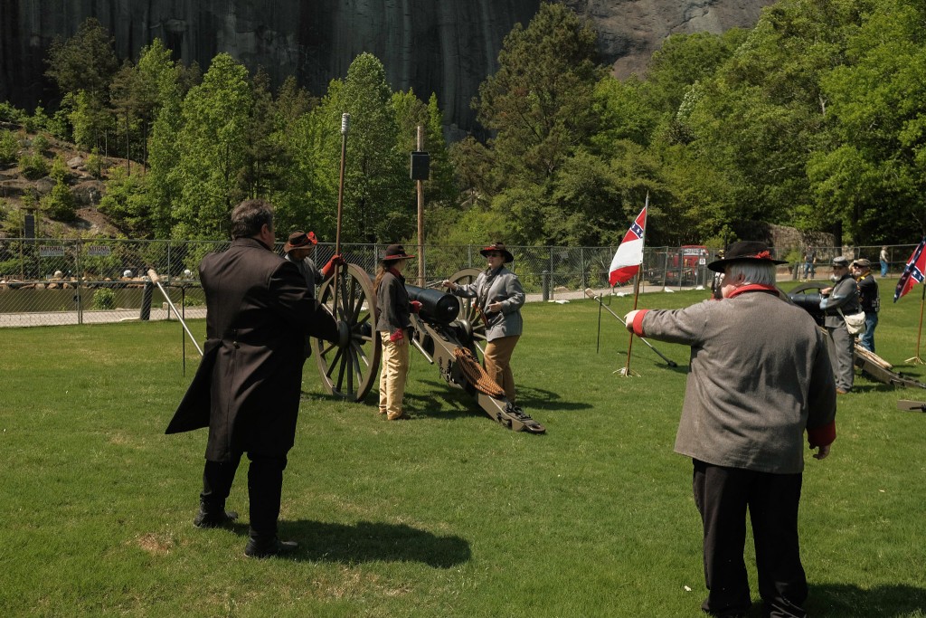 Confederate reenactors prepare a cannon to fire at the Confederate Memorial Day held by the Sons of Confederate Veterans.