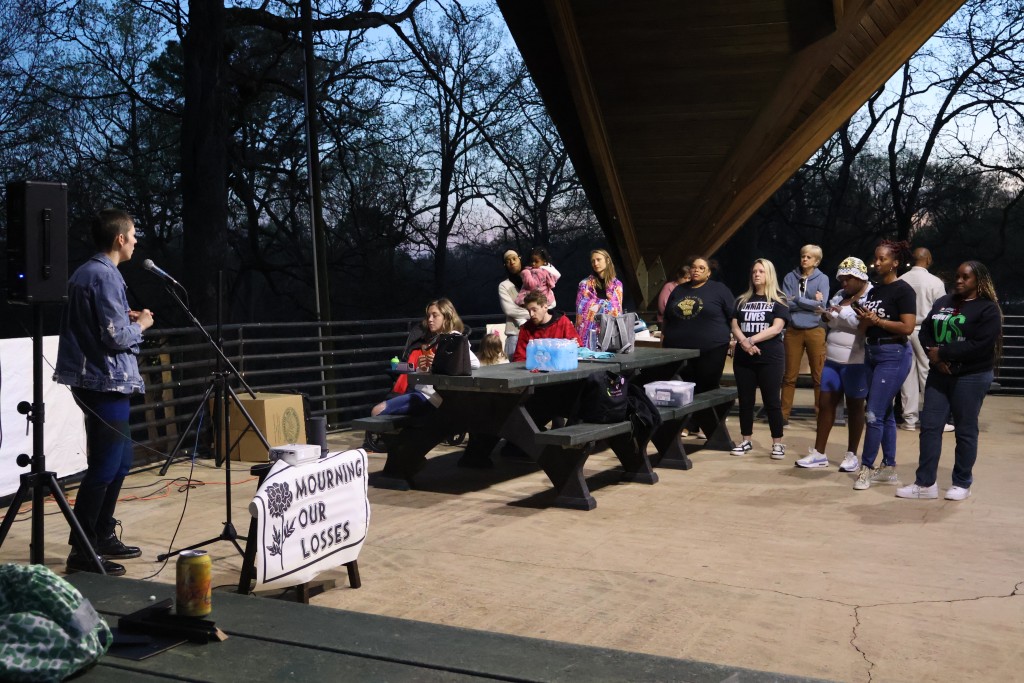 Page Dukes speaks to attendees at the Mourning Our Losses event remembring those who died of COVID-19 in Georgia Prisons. 