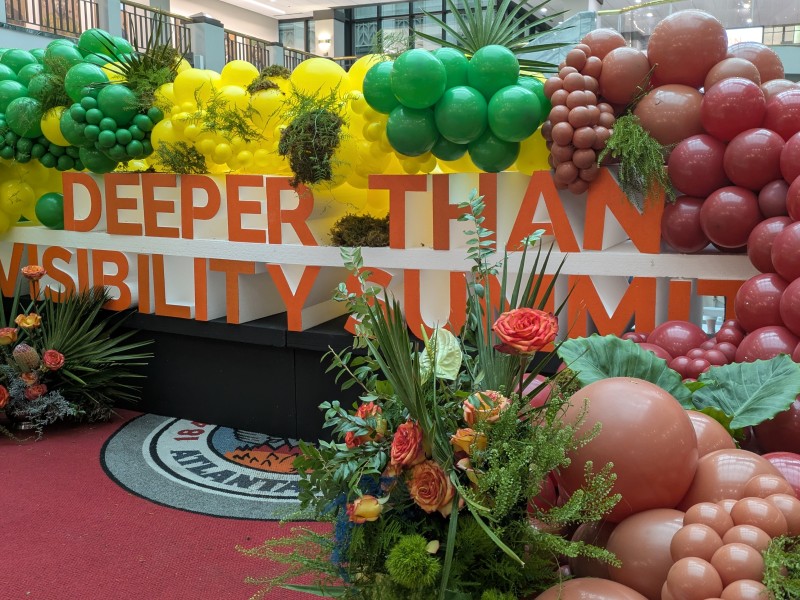The Deeper Than Visibility Summit sign inside Atlanta City Hall marks the city's celebration of Trans Day of Visibility.